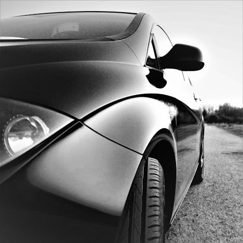 Foto profissional grátis de automóvel, carro preto, preto e branco