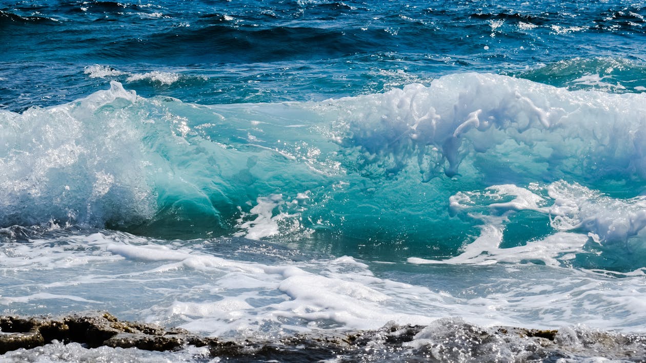 Free Sea Waves Hitting Rocks Stock Photo