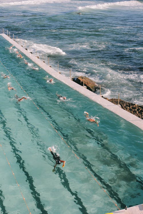 Free Swimming Pool next to the Sea Stock Photo