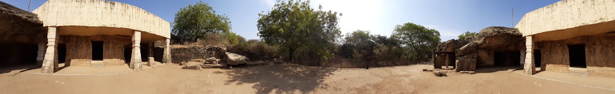 Person working on a laptop with a canned functional drink on the desk