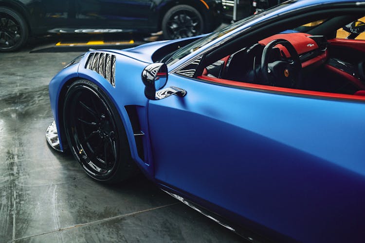 Stylish Sports Car Parked In Showroom