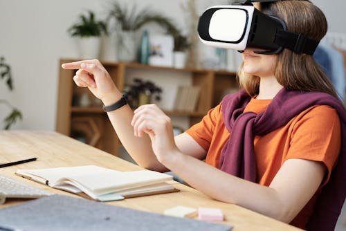 Free Girl Wearing Black and White Vr Goggles Stock Photo