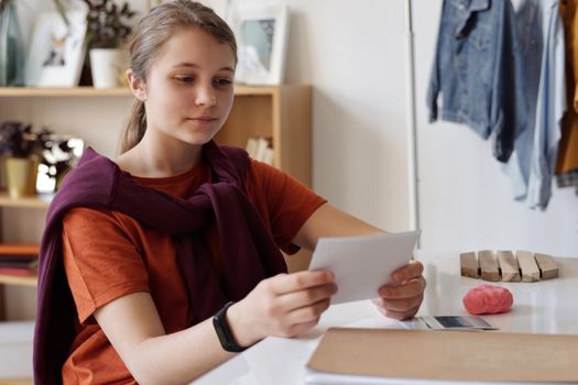 Girl Looking at a Picture