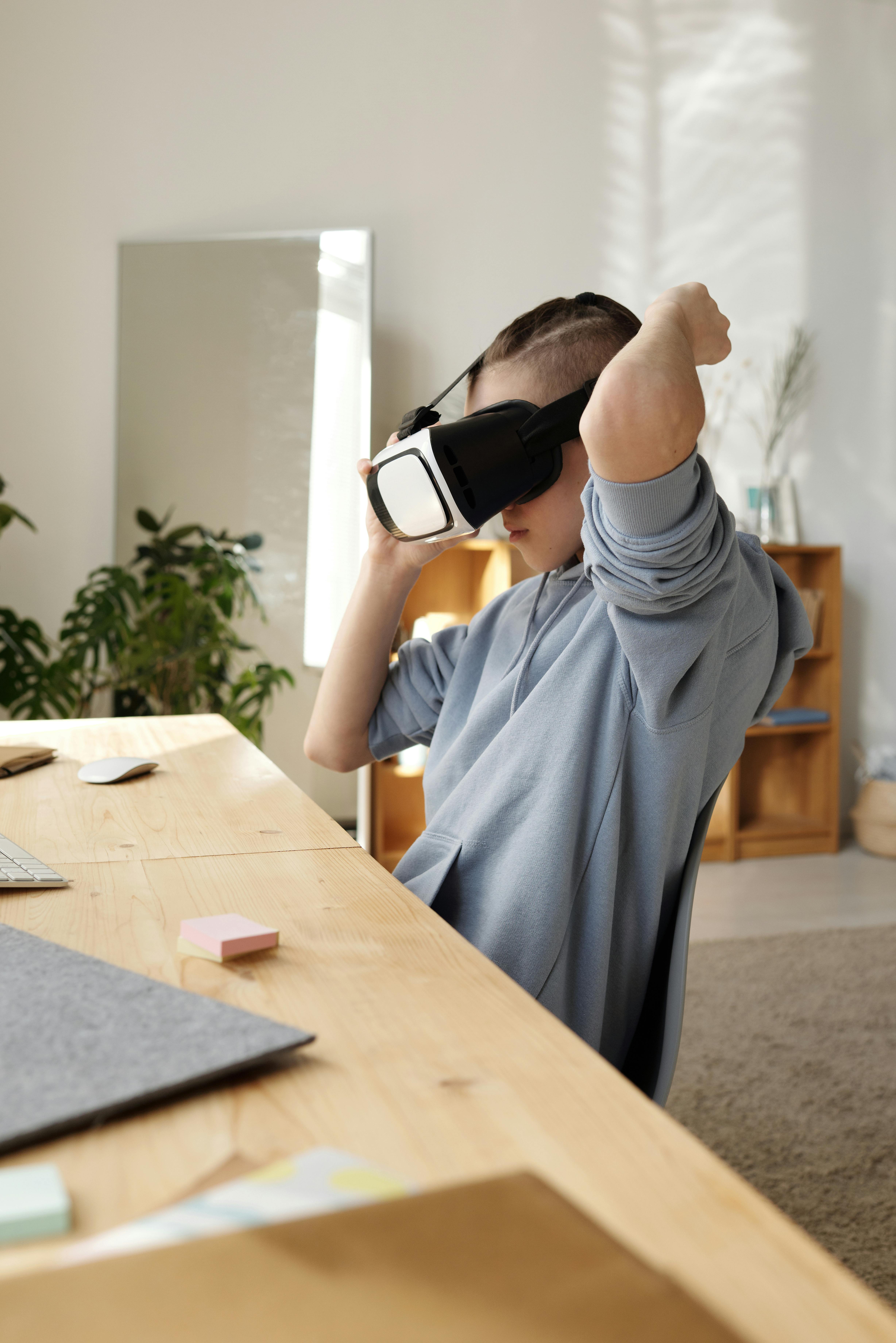 boy wearing vr headset