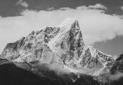 Free Grayscale Photo of Snow Covered Mountain Stock Photo
