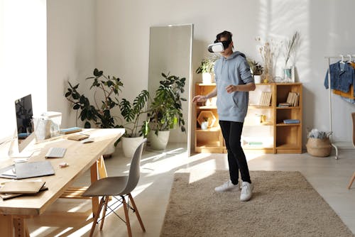 Free Photo of Boy Standing While Using Vr Headset Stock Photo