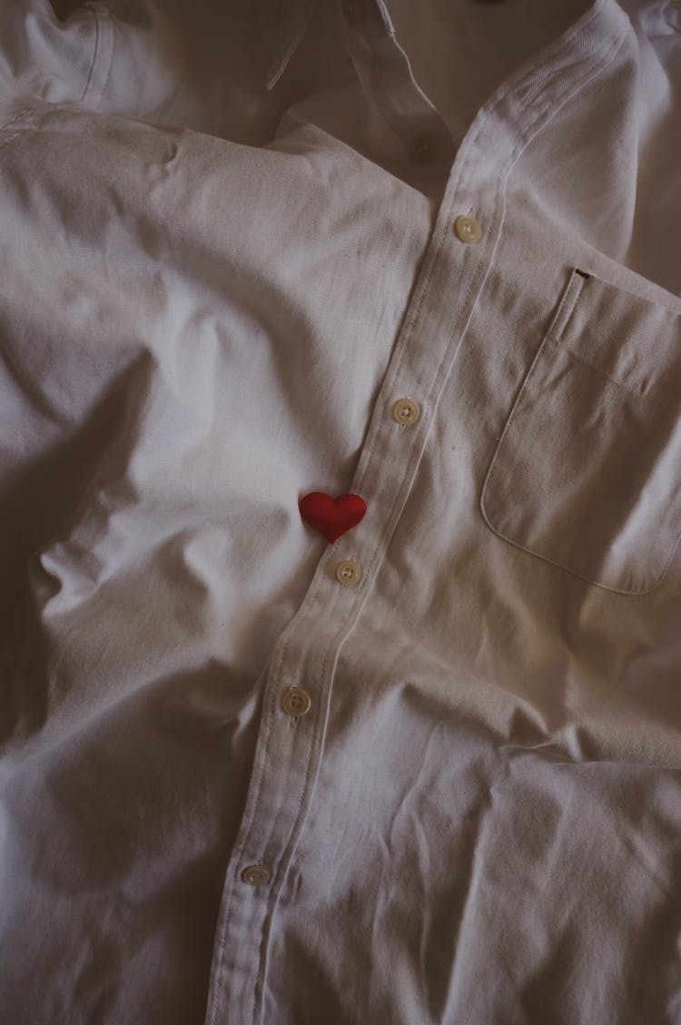 Heart Shaped Accessory On White Shirt