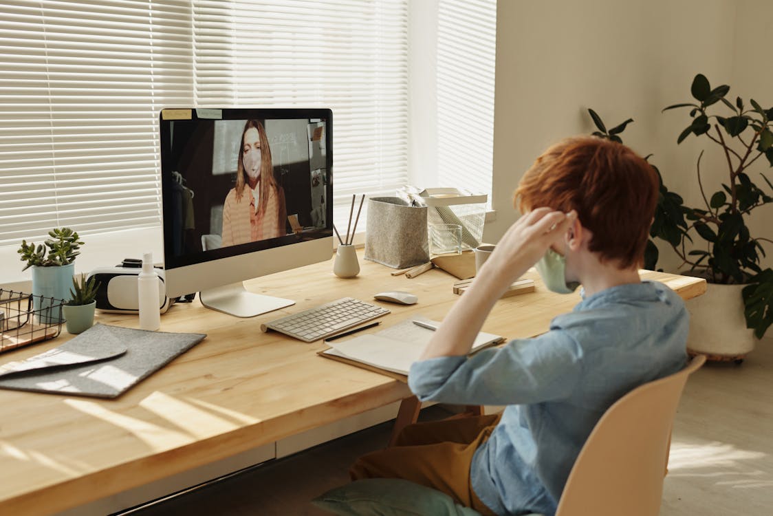 Photo of Boy Watching Through Imac