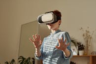 Photo of Boy Using Vr Headset