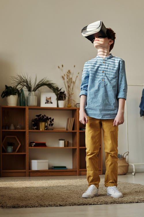 Photo of Boy Using Vr Headset