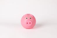 Close-Up Photo of Cute Pink Piggy Bank