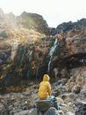 Person Looking at Waterfalls