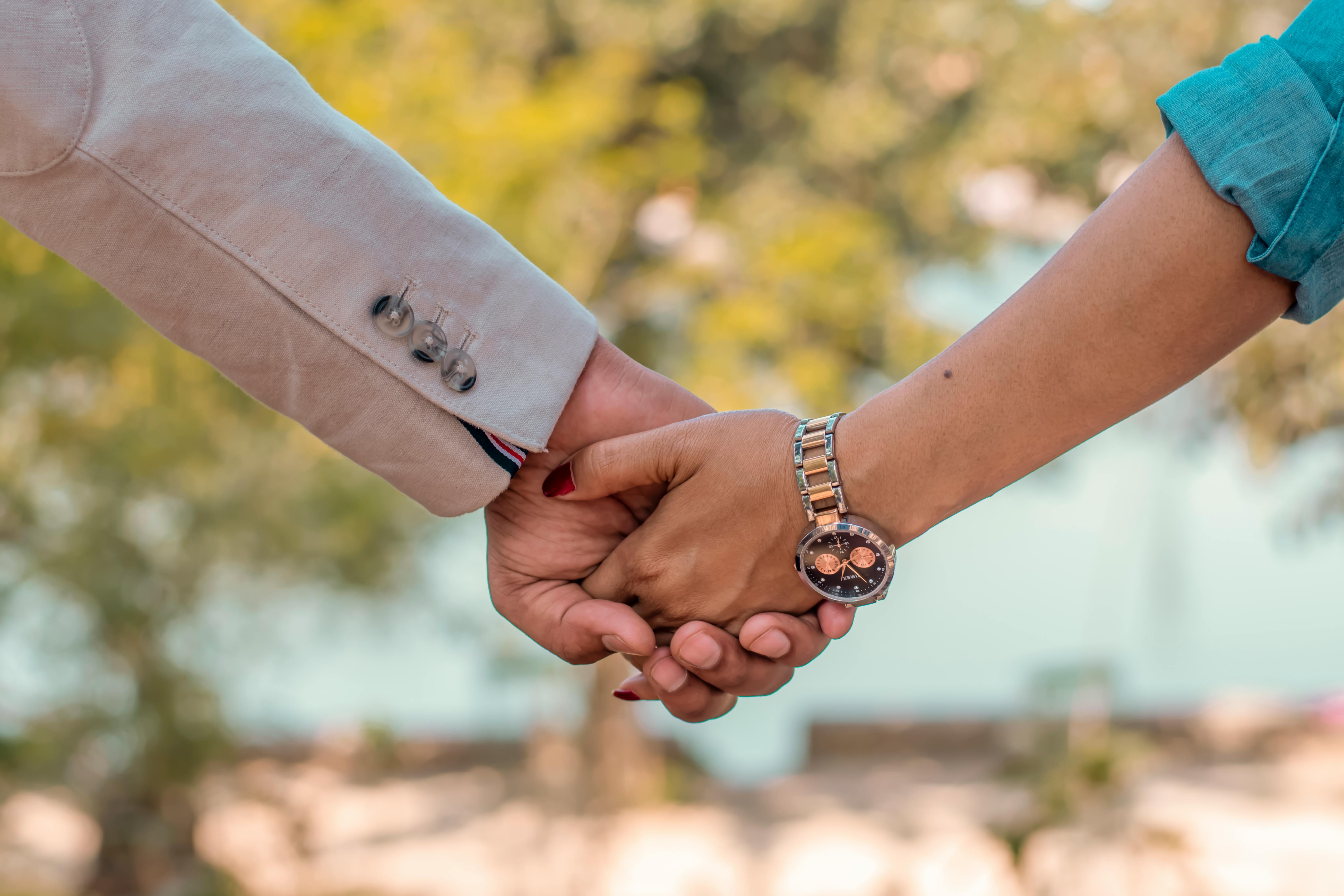Man And Woman Holding Hands Free Stock Photo