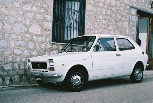 A Car Parked Outside a Building