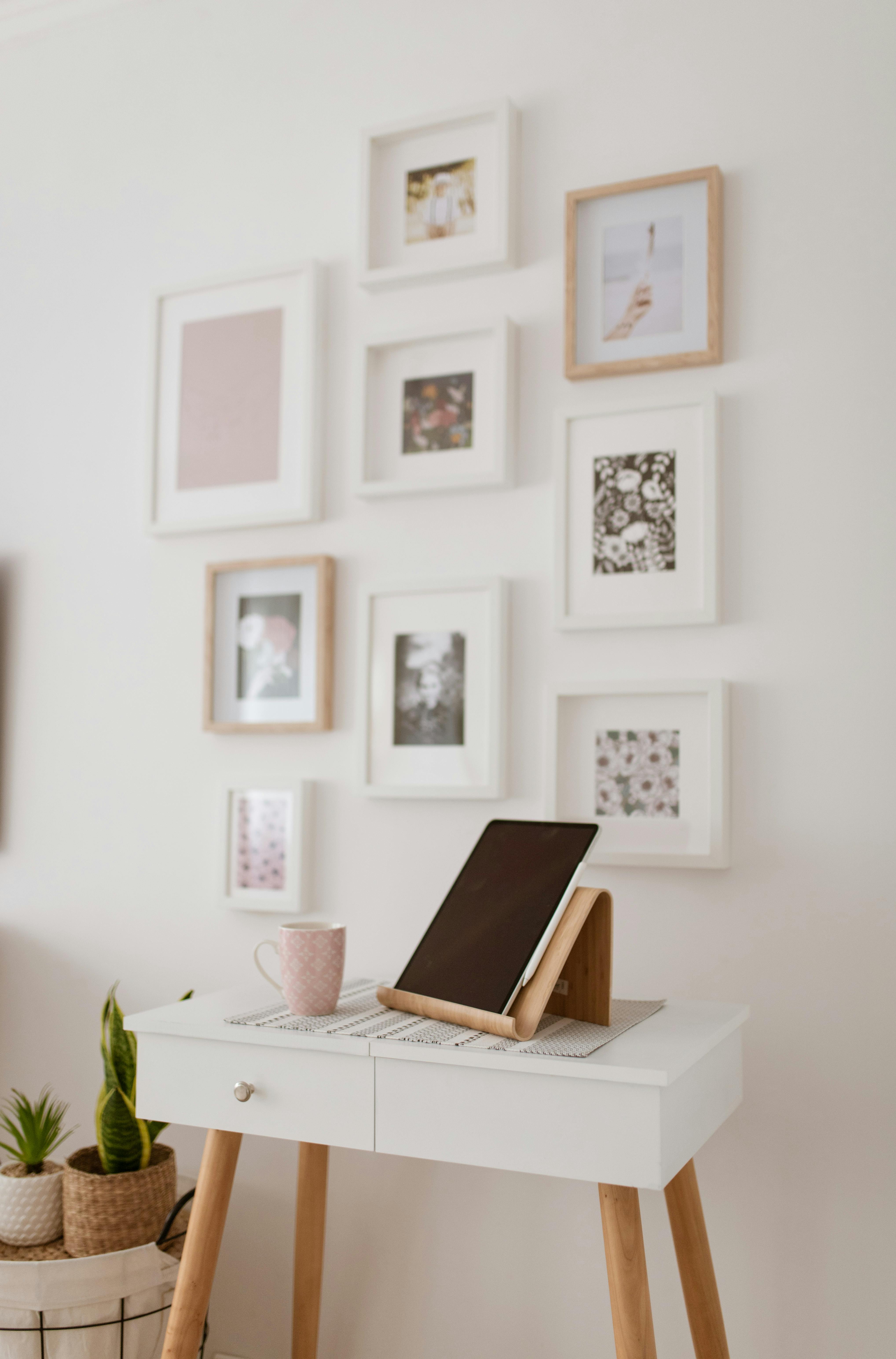 Black Laptop Computer On White Wooden Desk Free Stock Photo