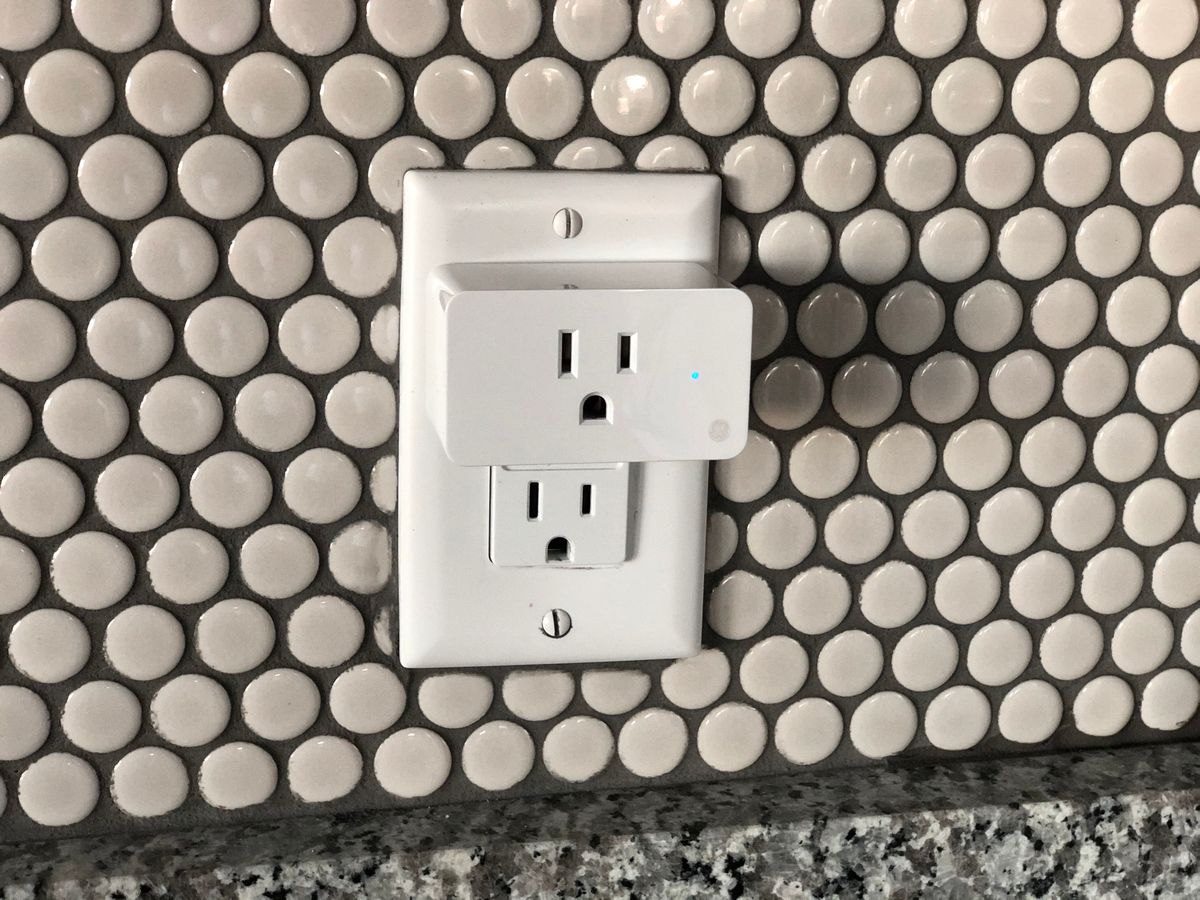 Close-up of an electrical wall socket in a modern kitchen