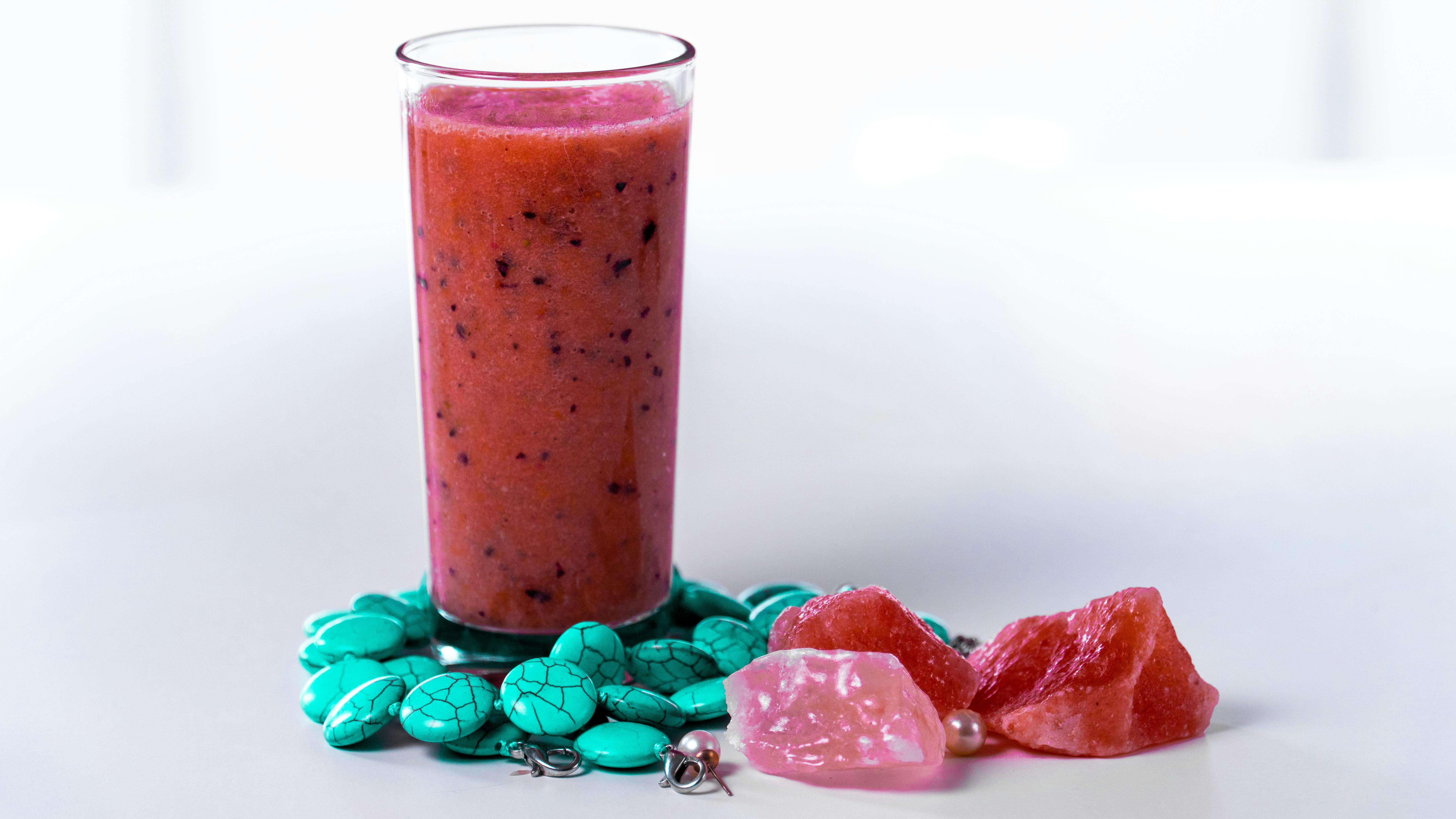 Developer using a laptop while testing a VR headset