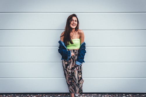 Free A Fashionable Woman Posing and Smiling Stock Photo