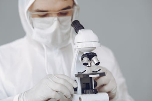 Person Using a Microscope
