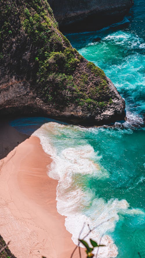 Amazing scenery of rocky cliffs washed by azure seawater