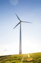 White Windmill on Grass Field