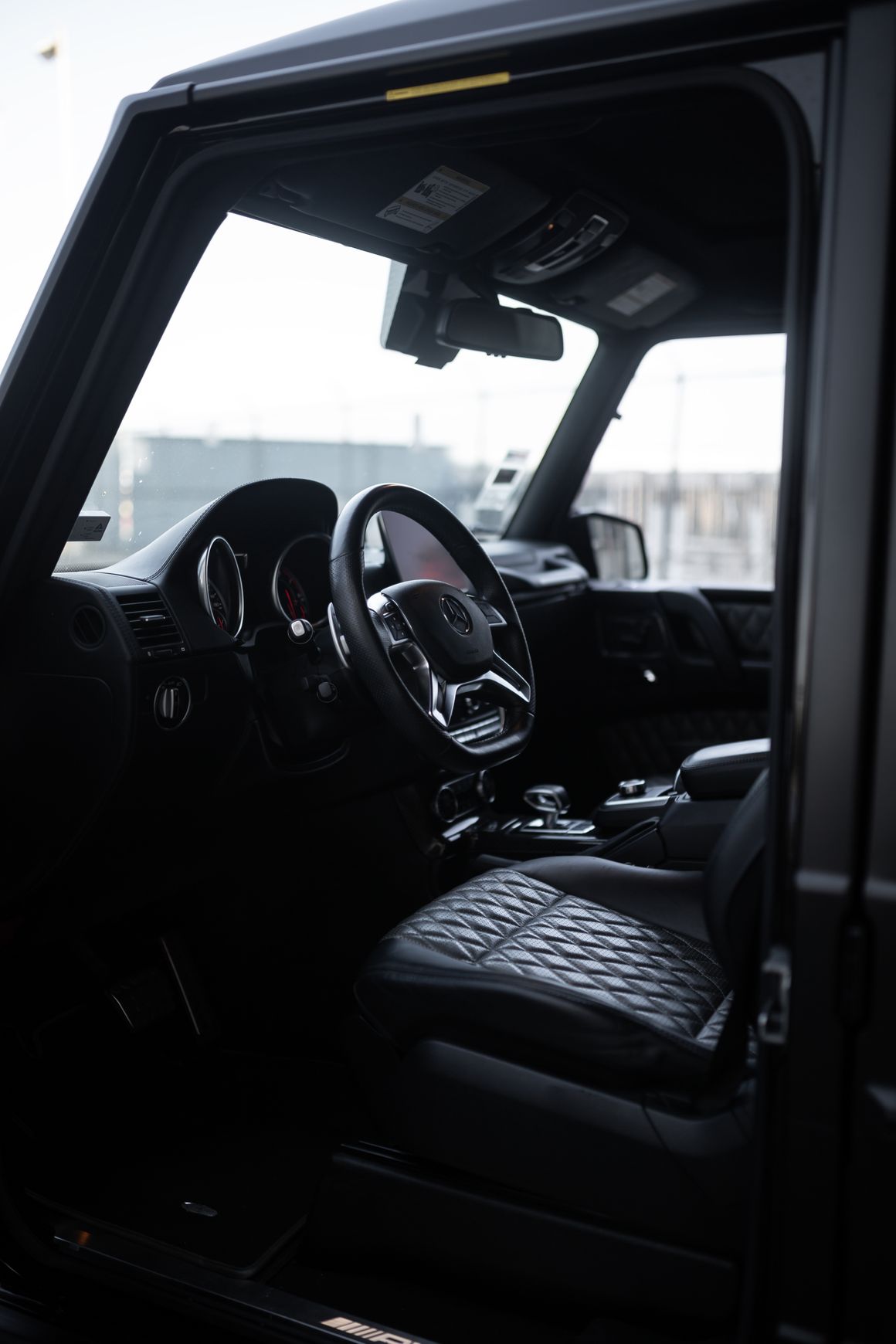 Premium black vehicle interior with seats and dashboard