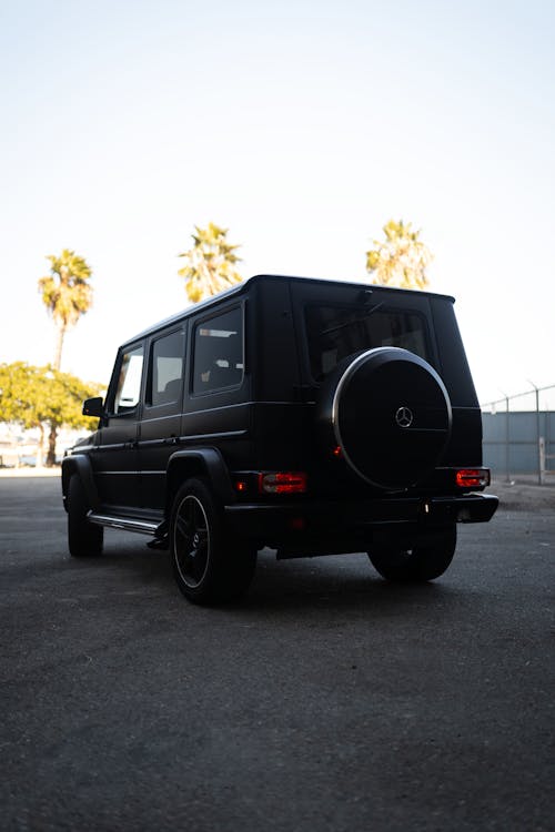 Black Suv Parked on Pavement