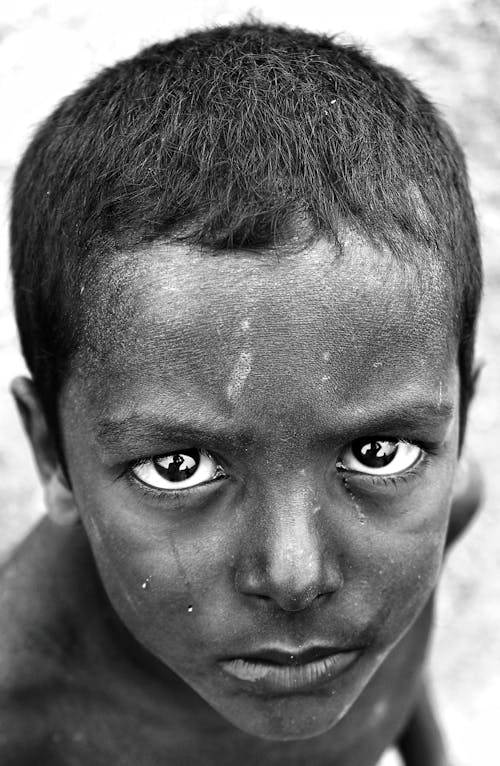 Focused black boy with deep gaze