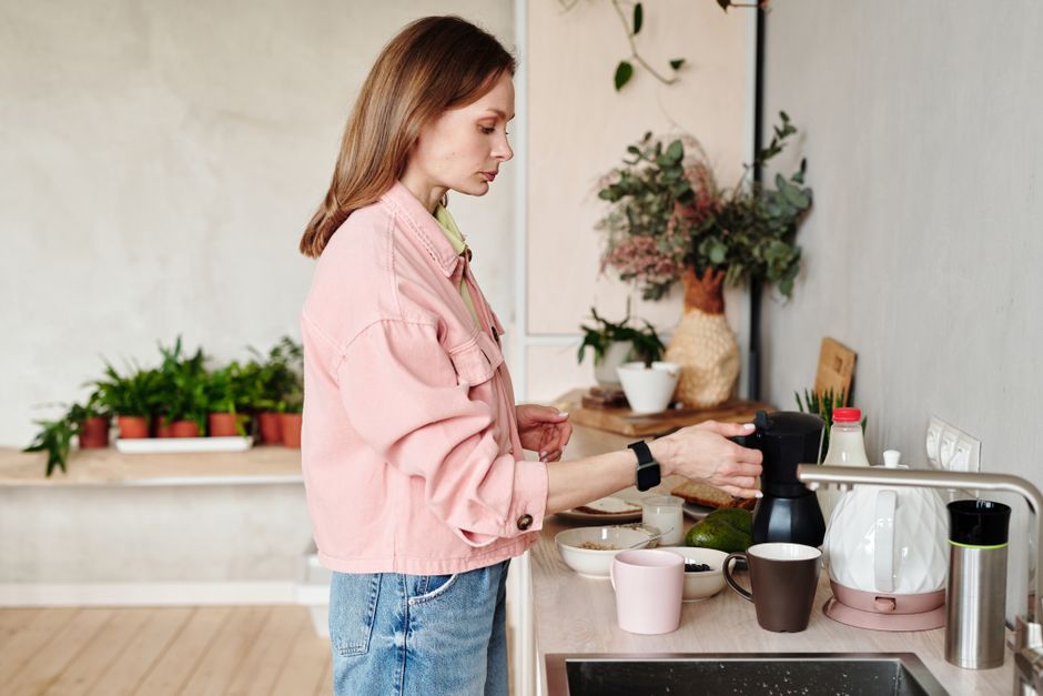 at the kitchen counter before breakfast the visible routine is simple but the preparation happens too late lifestyle photo 1