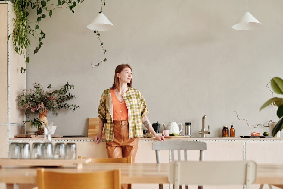 A Guide to Choosing the Perfect Foldable Plant Stand in Bandra for Your Tiny Home Person selecting a foldable plant stand in a home decor store in Bandra, Mumbai, India