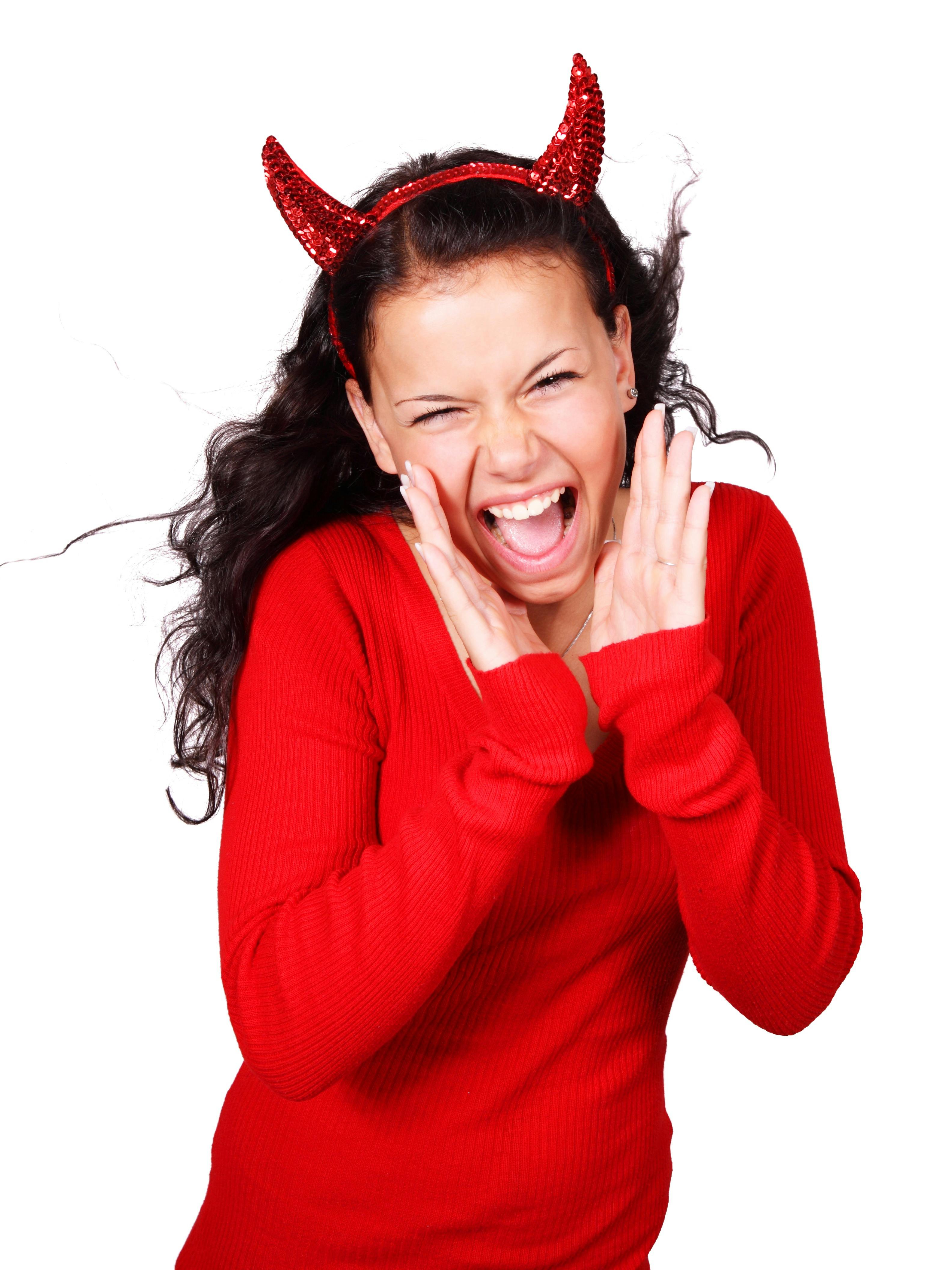 Shouting Woman Wearing Red Devil Horns Headband · Free Stock Photo