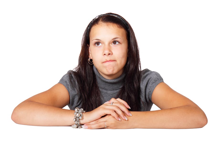 Woman in Gray Blouse Sitting