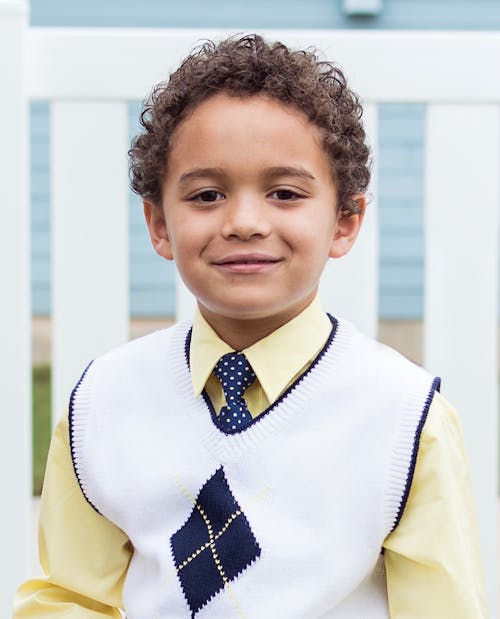 Boy in White and Black Top