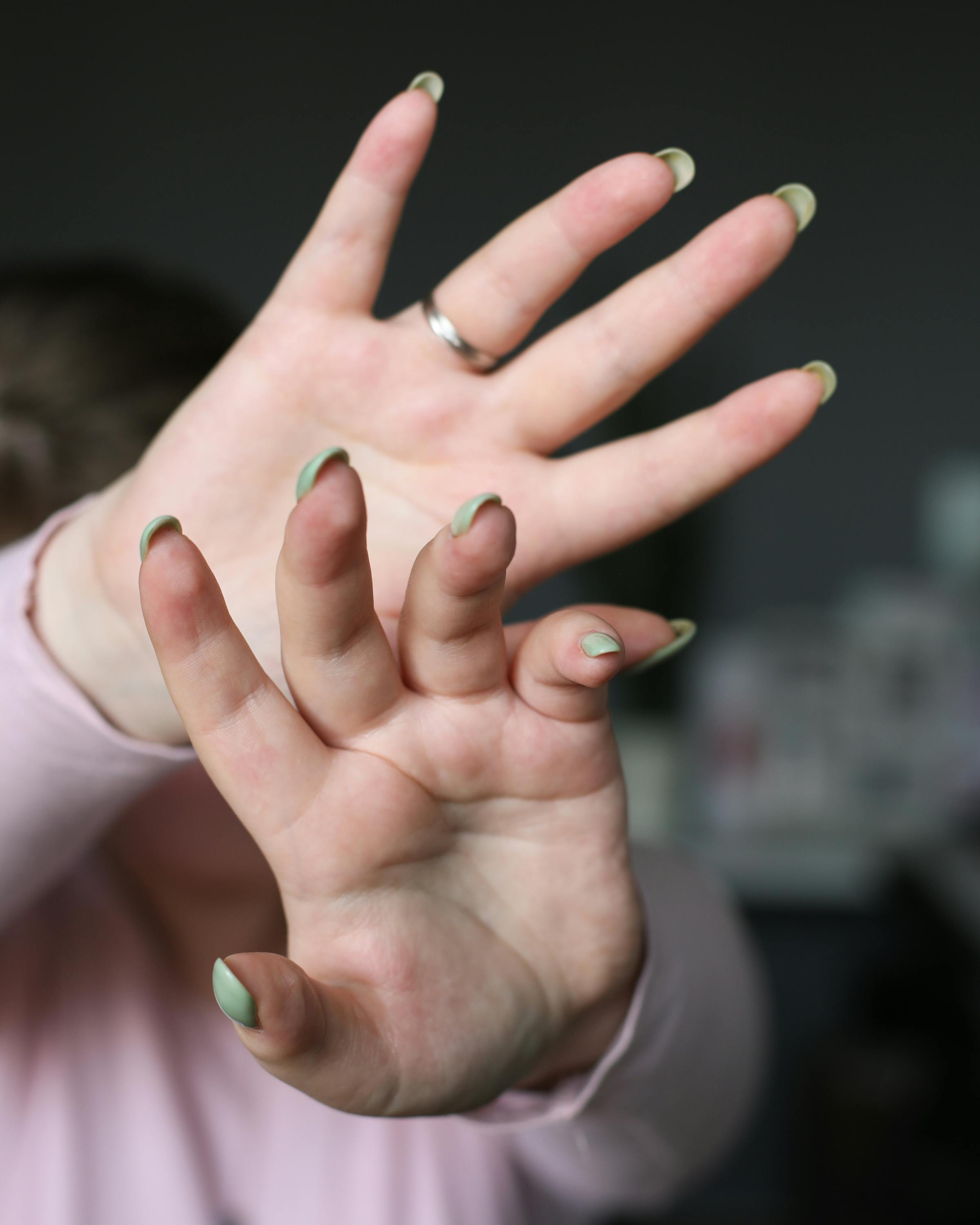 Free Crop woman showing hands with manicure at home Stock Photo