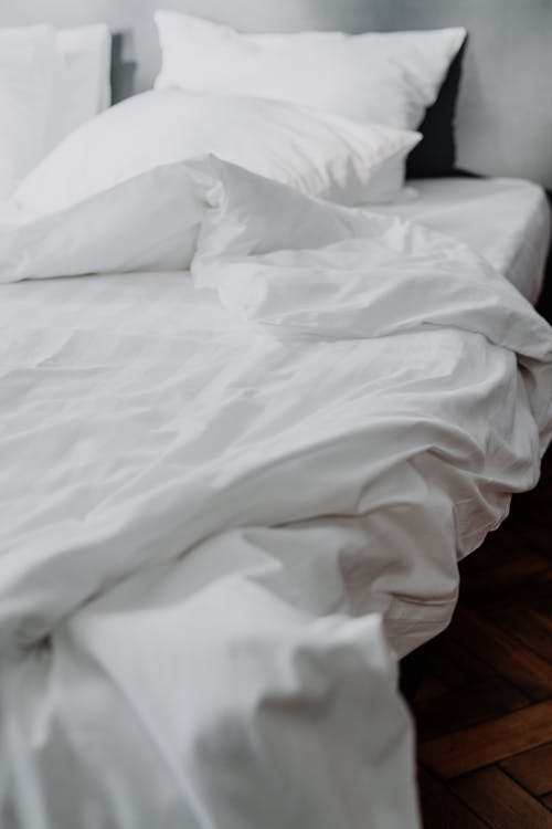 Free White Bed Linen on Bed Stock Photo