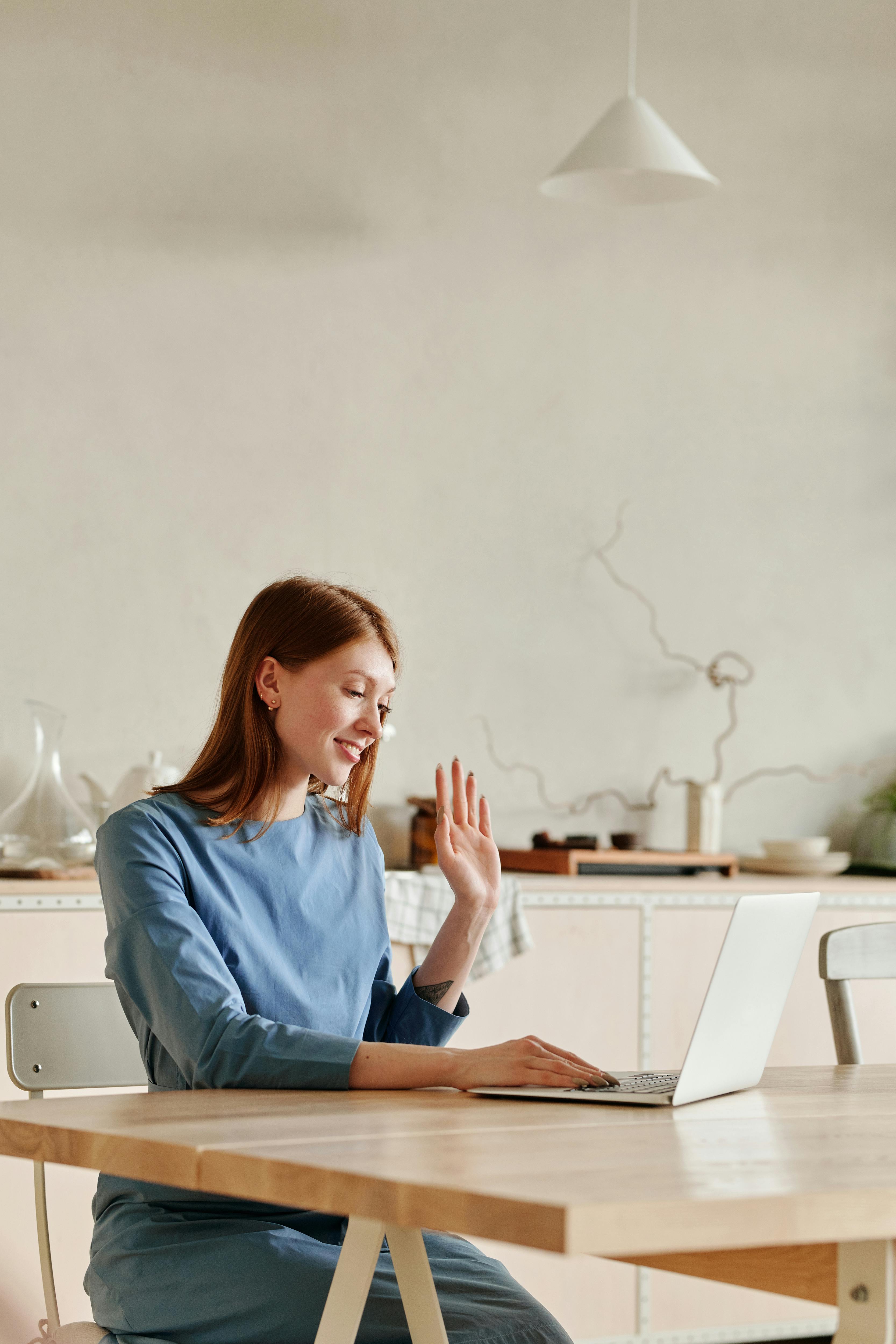 a woman having a video call from home