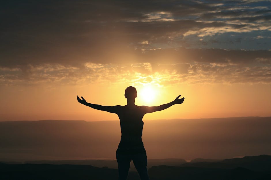 Silhouette Photography of Person Spreading Arms