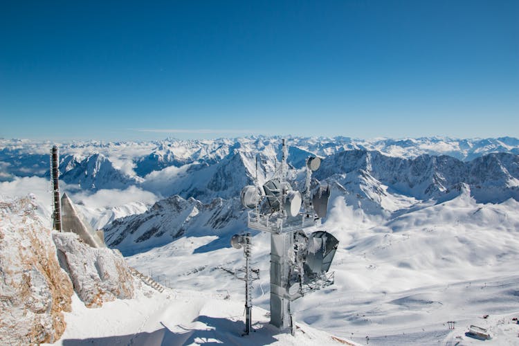 Radio Tower In Snowy Mountains