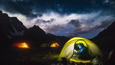 Green Tent Under Black Sky
