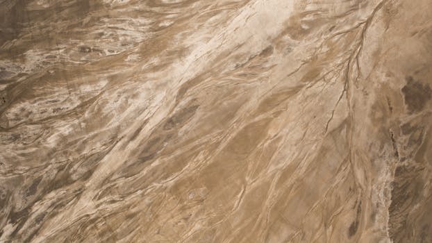 A mesmerizing aerial view of sandy desert patterns in Djibouti, showcasing natural textures.