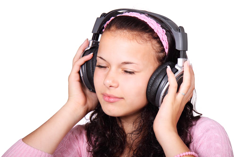 Woman Wearing Black On-ear Headphones.