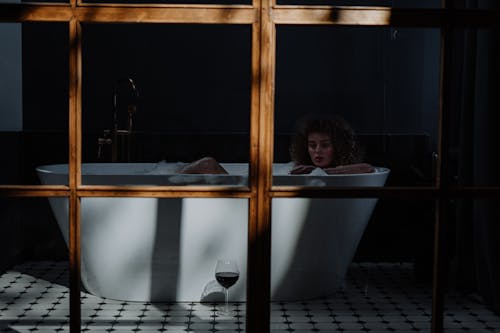 Woman in Bathtub With Water