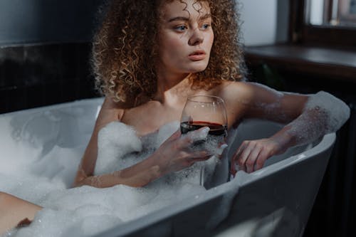 Woman in Bathtub With Water