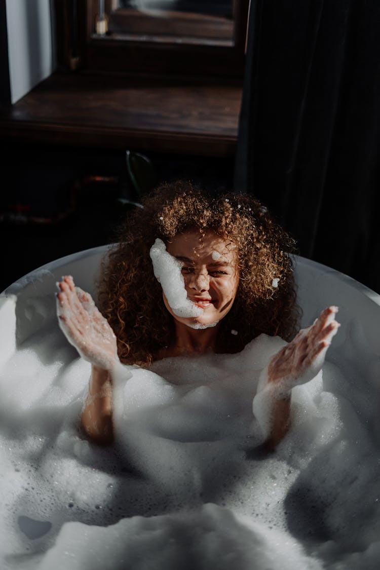 Woman In Bathtub With Water