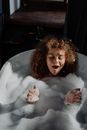 Girl in Bathtub With Water