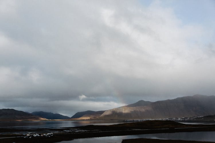 Mountains And Lakes Under Cloudy Sky