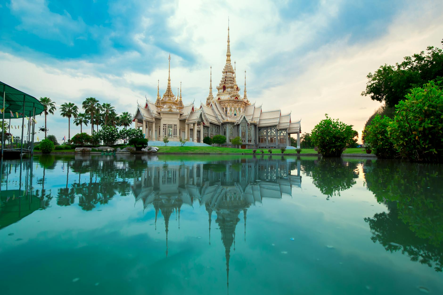 A traditional temple over a blue lake. 