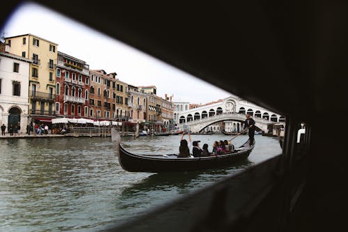 People Riding on Boat on River