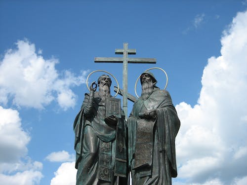 Low-angle View of Two Standing Men Statue
