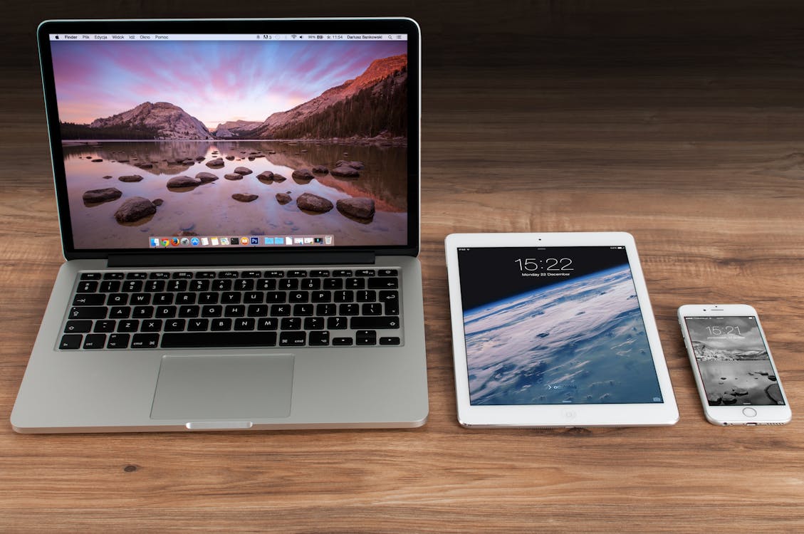 Free Macbook Pro Beside White Ipad Stock Photo